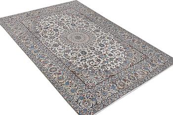 A Keshan carpet, c. 292 x 191 cm.