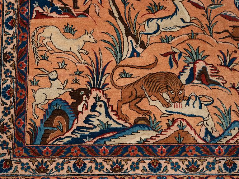 A carpet, a semi-antique Kashan, a so called Dabir, ca 383,5-387,5 x 269,5-275 cm.