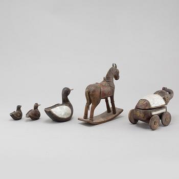 Five wooden toys from the latter half of the 20th century.