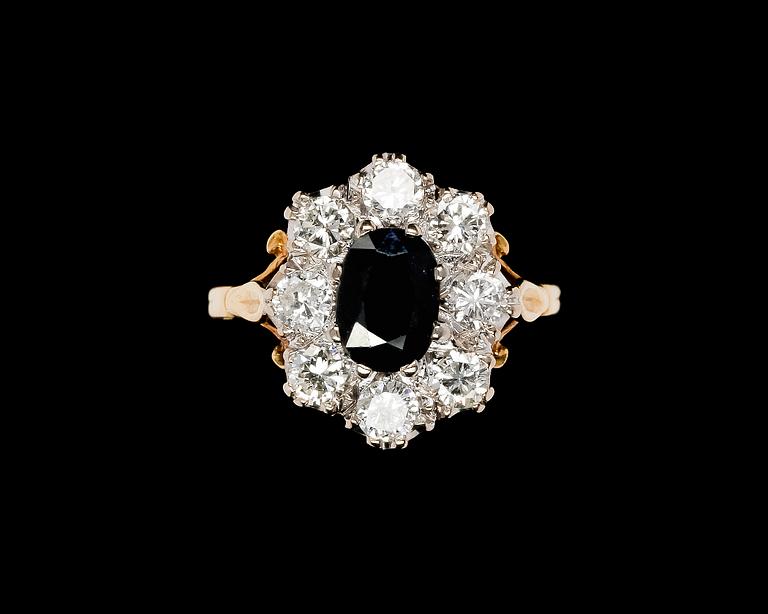 Ring, blue sapphire and brilliant cut diamonds tot ca 1,60 ct. 18 k gold. Size 18/55.