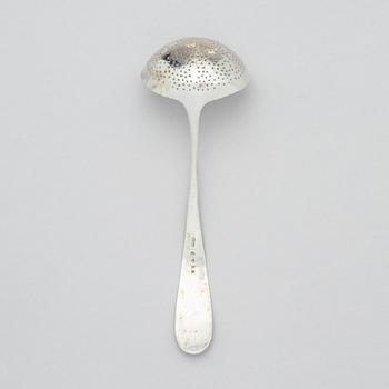 A Swedish Empire silver sugar bowl with lid and a suger sprinkle spoon, marks of Adolf Zethelius, Stockholm 1819.