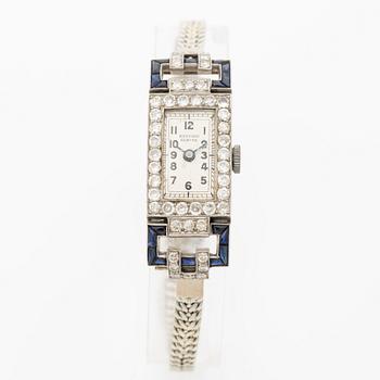 Ladies’ wristwatch in platinum and 18K white gold with old-cut diamonds and sapphires, Art Deco.