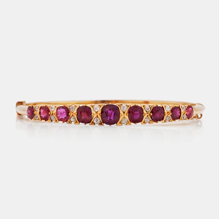 An old cut diamond and ruby bracelet. Total carat weight of diamonds circa 0.30 ct.