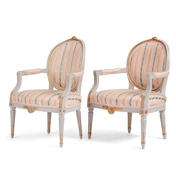 A pair of Gustavian carved armchairs, late 18th century.