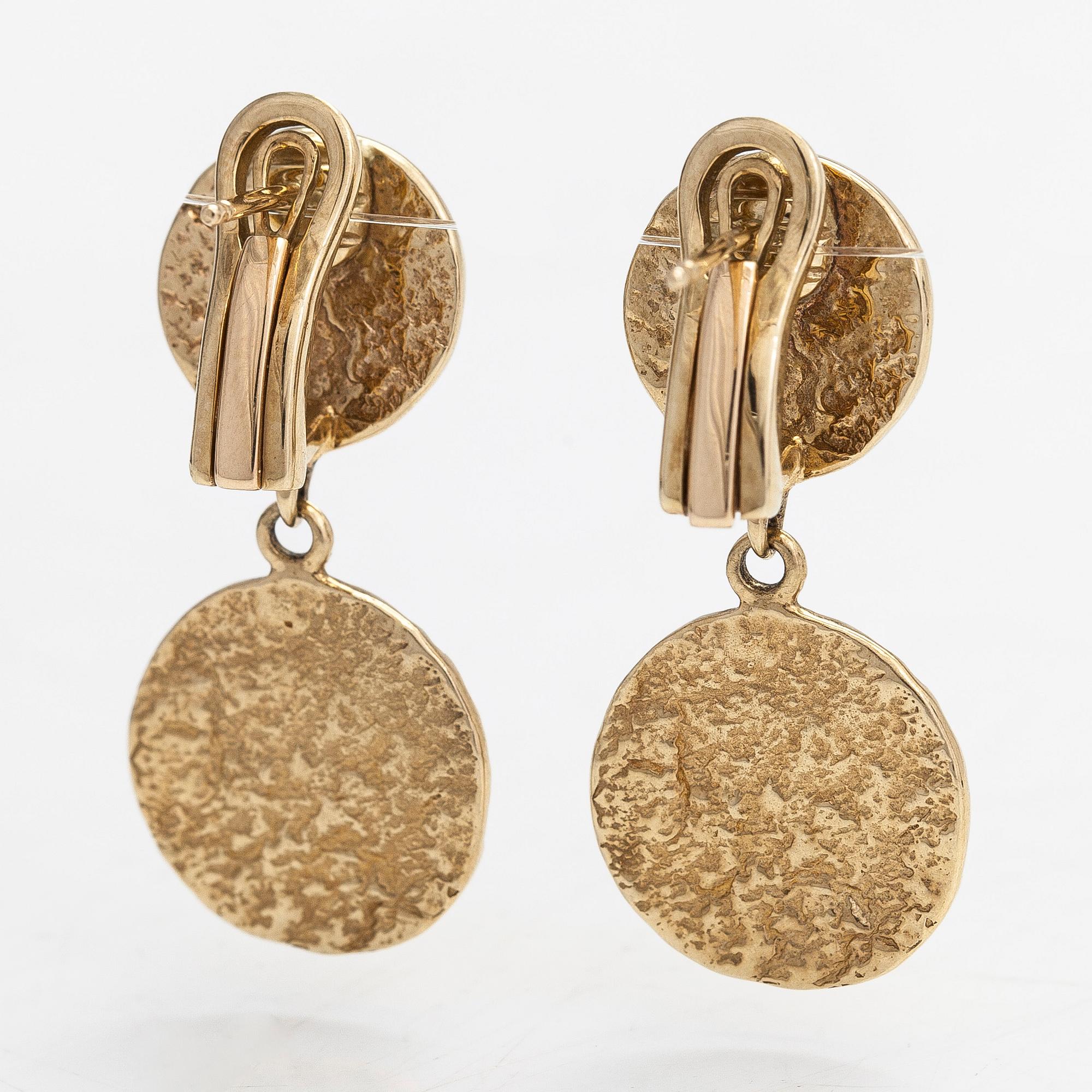 Cassandra Goad, a pair of 9K gold 'Tortilla Double' earrings. London.
