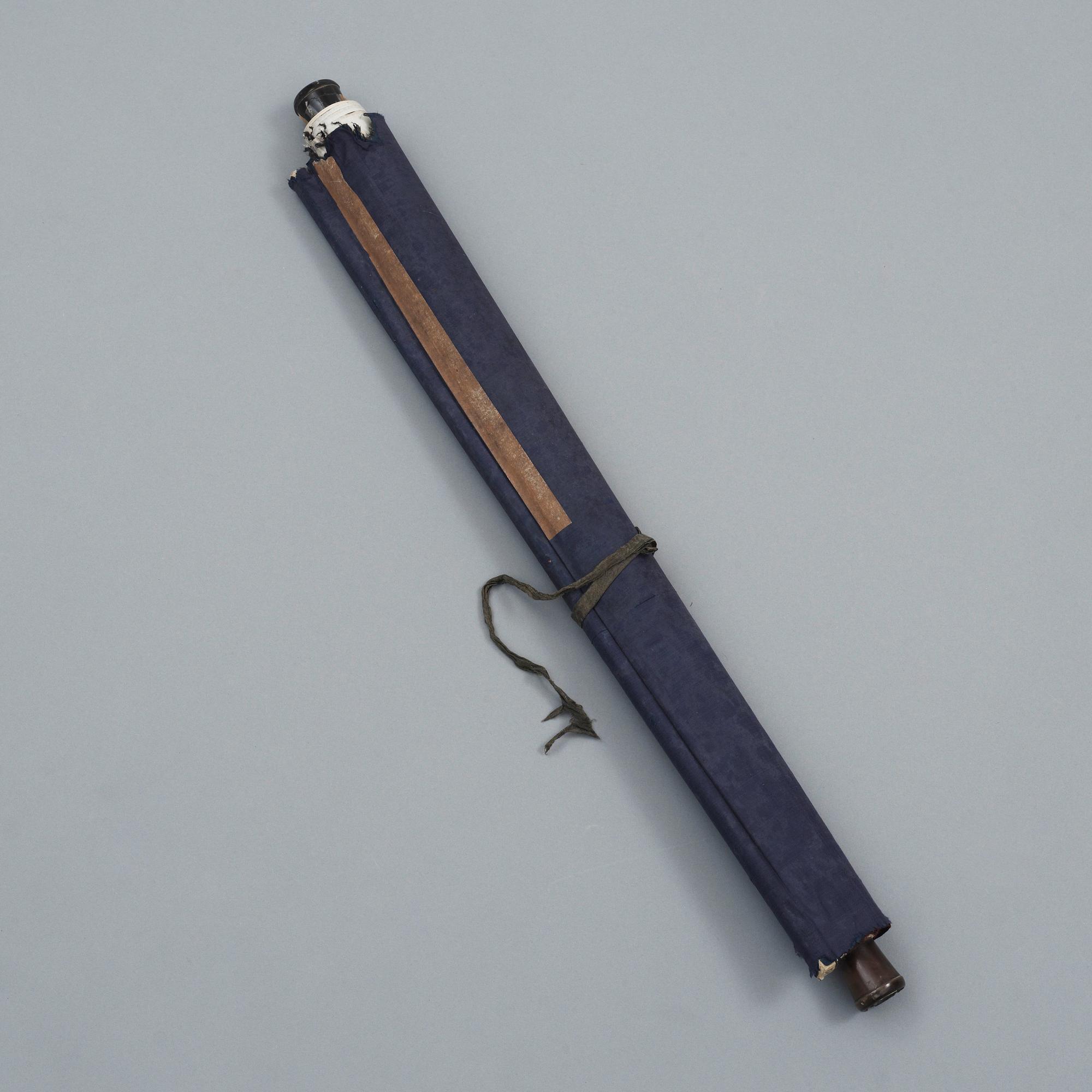 A hanging scroll with flowers and items from the scholars desk, late Qing dynasty (1644-1912).