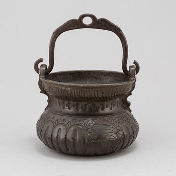 A holy water bowl dated 1620.