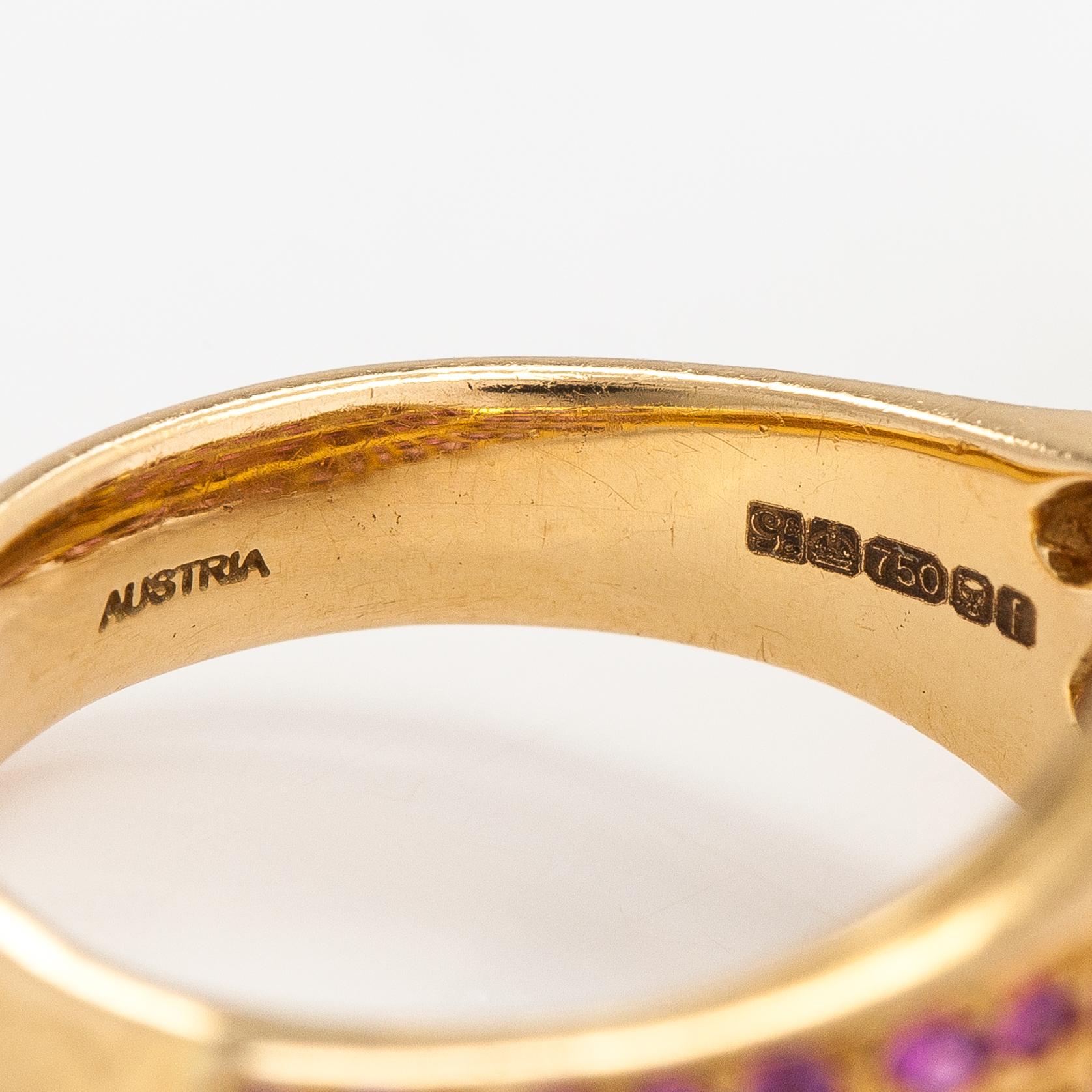 Garrard, ring "Wings", 18K guld och rubiner. Märkt Garrard 52 Austria.