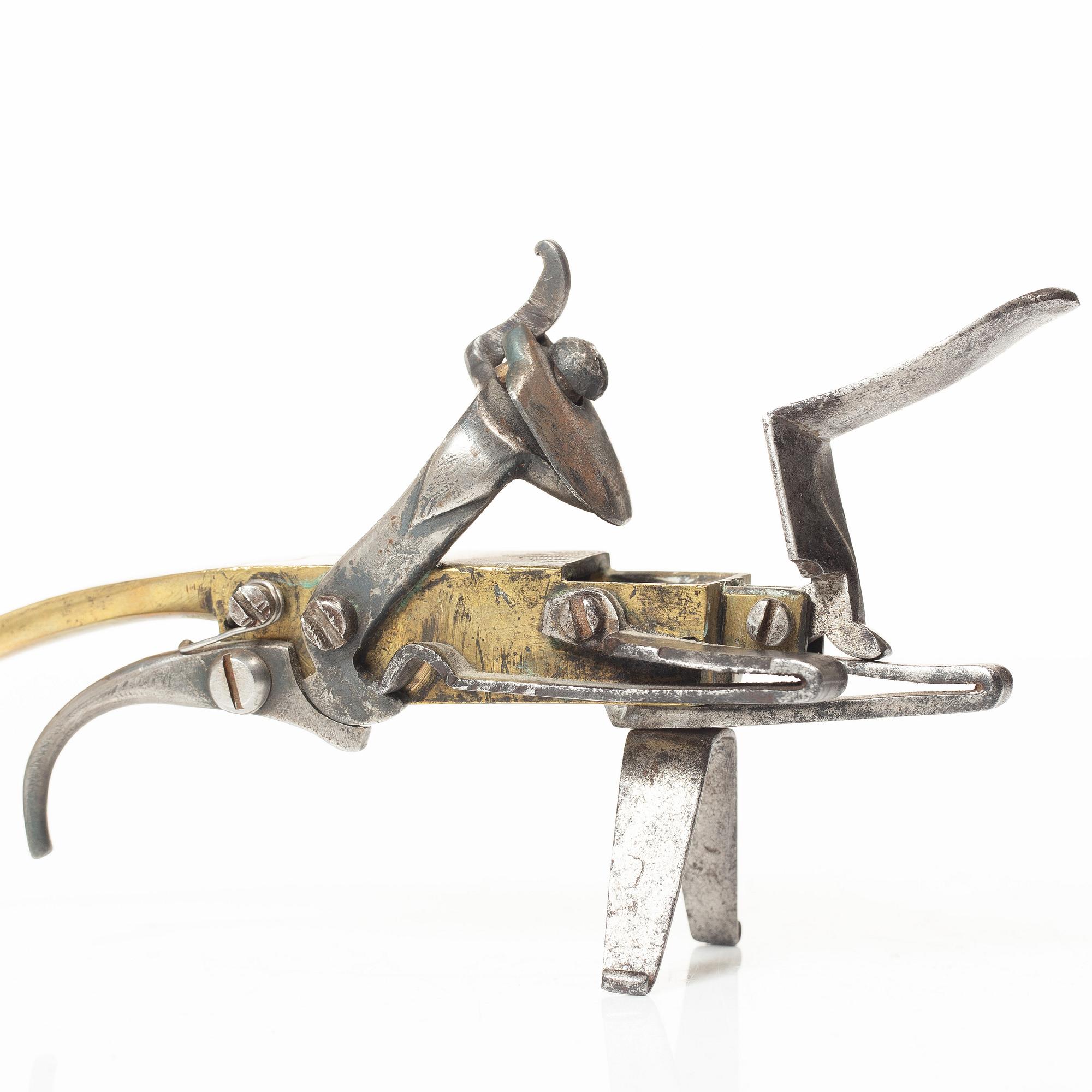 A Northern European flintlock lighter, mid 18th century.