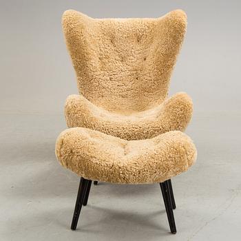 A Nordiska Kompaniet armchair and stool.