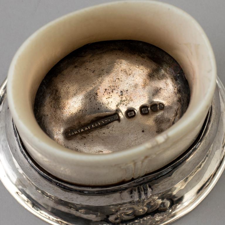 A Swedish Art Nouveau silver and coconut stemcup and a silver and ivory beaker, Makers mark Märta af Ekenstam, Malmö.