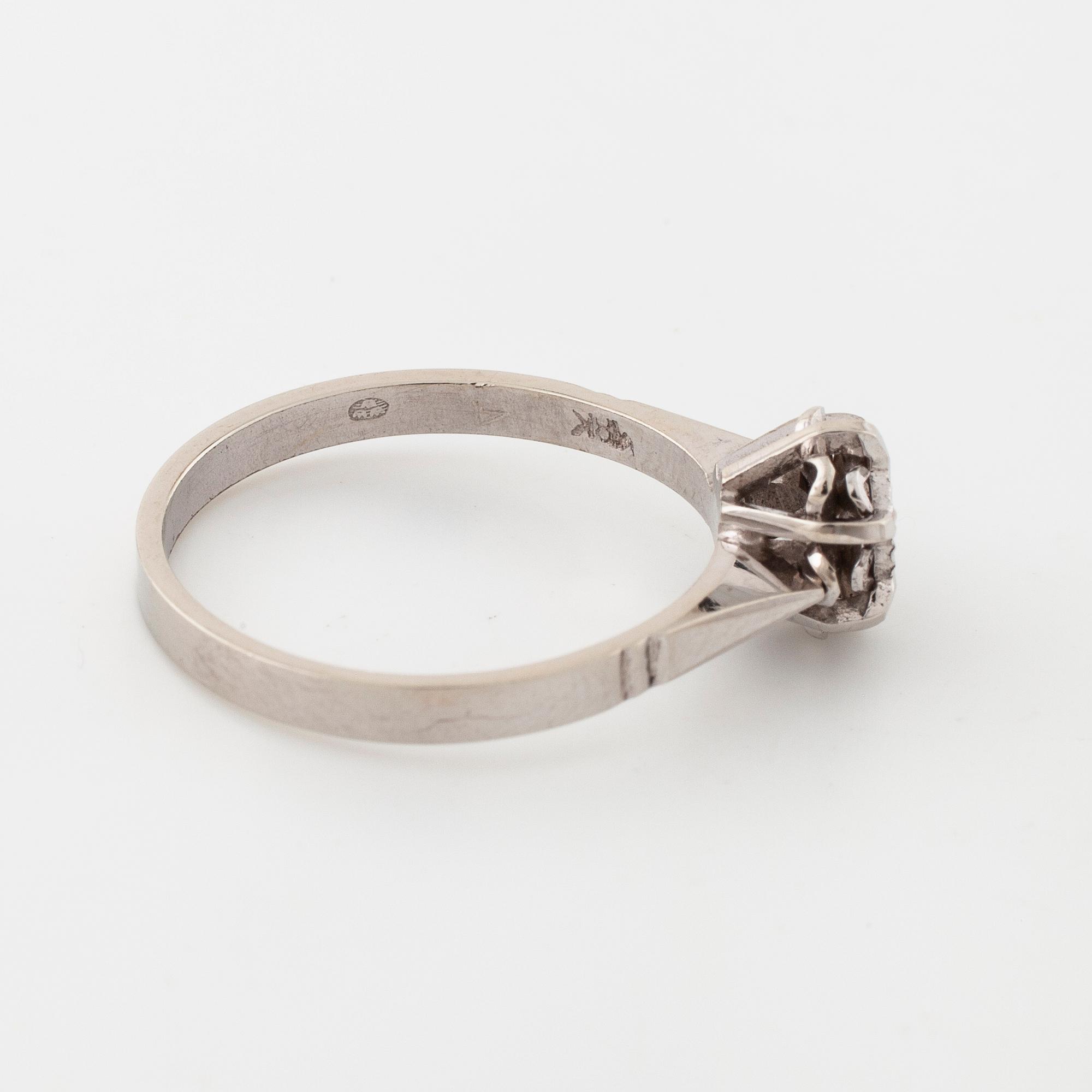 A single cut diamond ring.