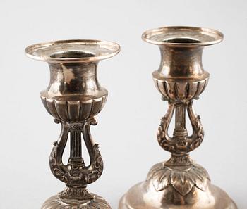 A pair of silver candelsticks by Daniel Eklund, Kalmar, empire, 1854, weight 163.
