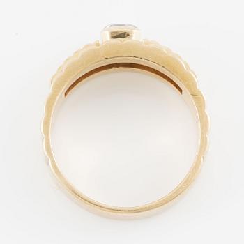 Ring, 18K gold with emerald-cut diamond.
