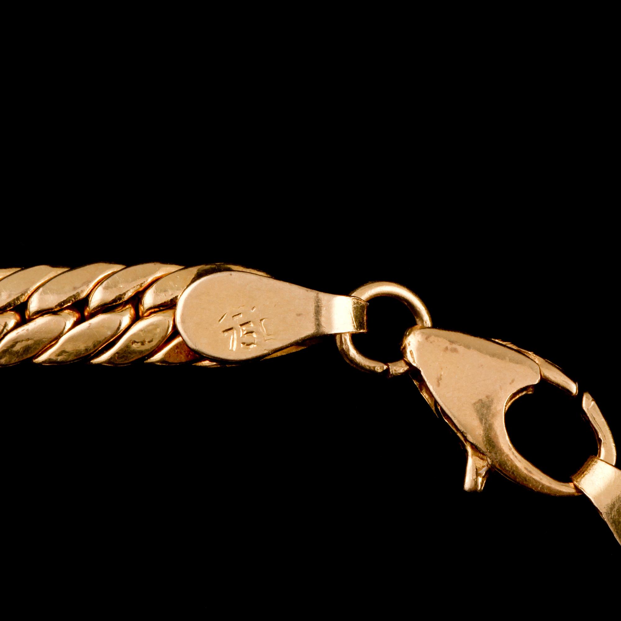 COLLIER, 18k guld med smaragd samt navette-, baguett- och briljantslipade diamanter, utländska stämplar. Vikt 36 g.