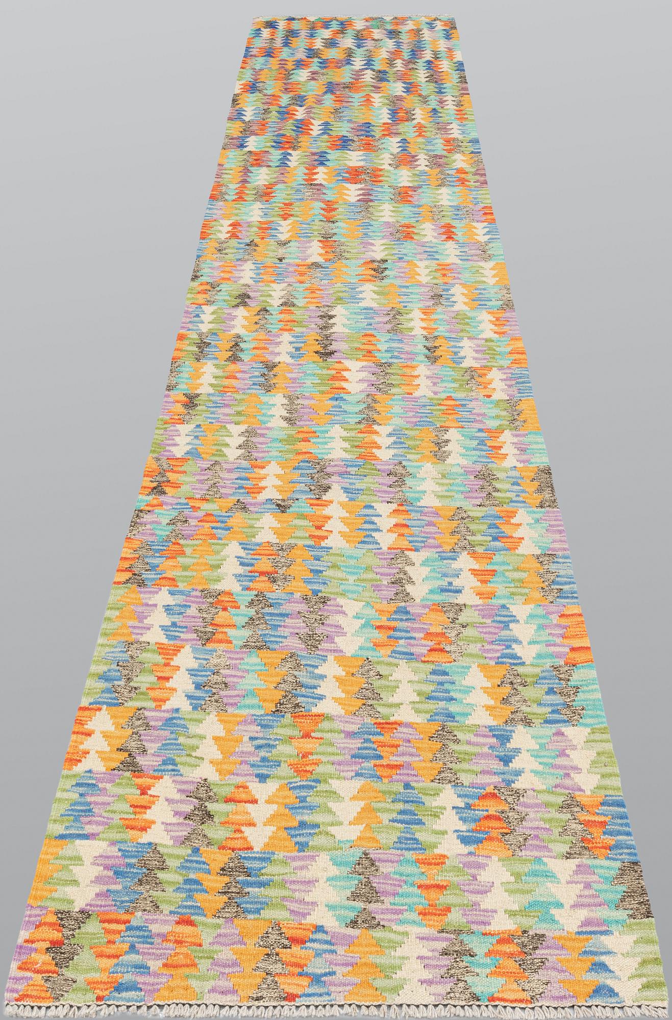 A runner, kilim, ca 391 x 80 cm.