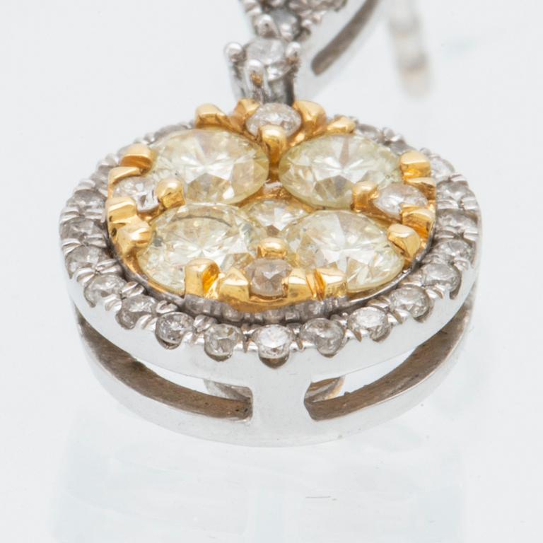 Earrings in 14K white and red gold with round brilliant-cut diamonds.