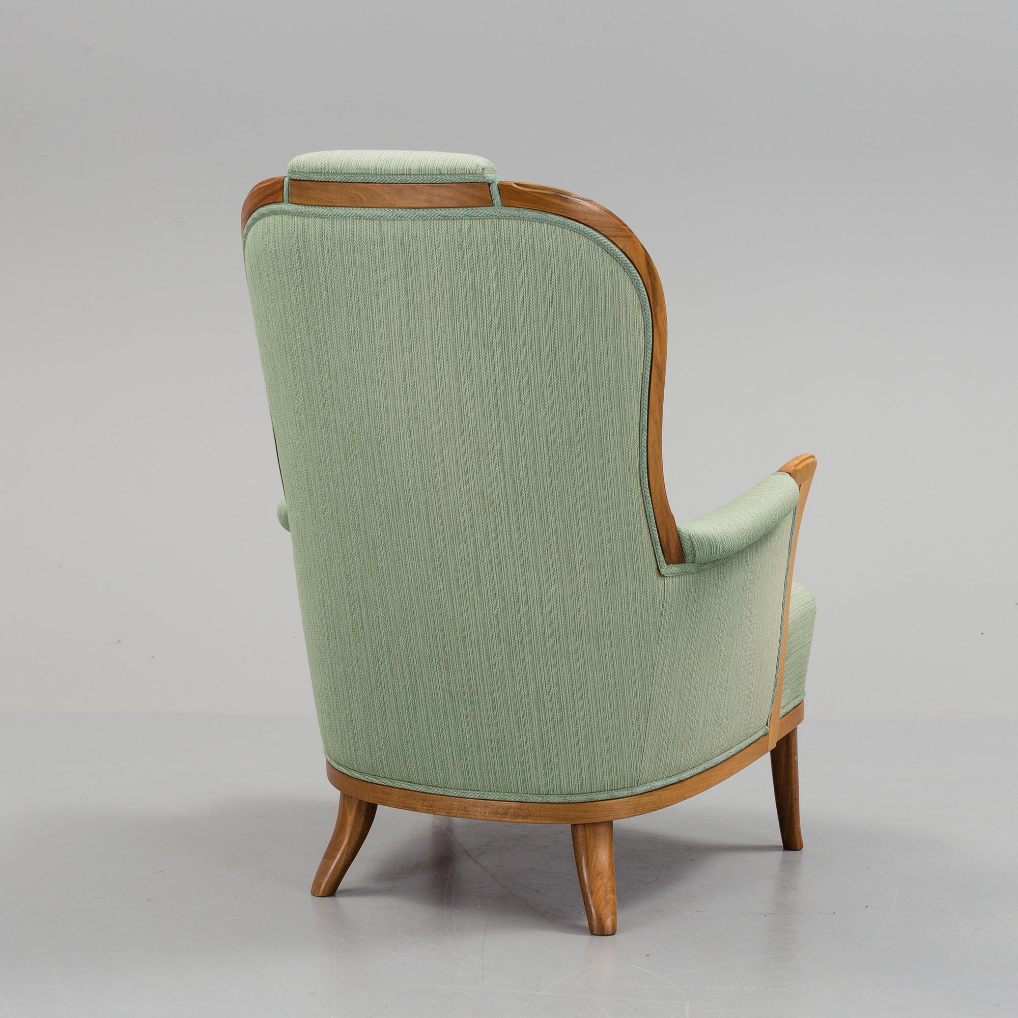 a Carl Malmsten "Vår Fru" armchair from the second half of the 20th century.