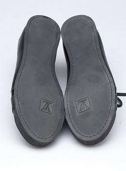 SKOR, Louis Vuitton.