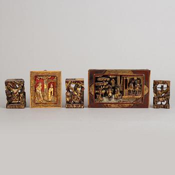 A set of five wooden panels, late Qing dynasty, circa 1900.
