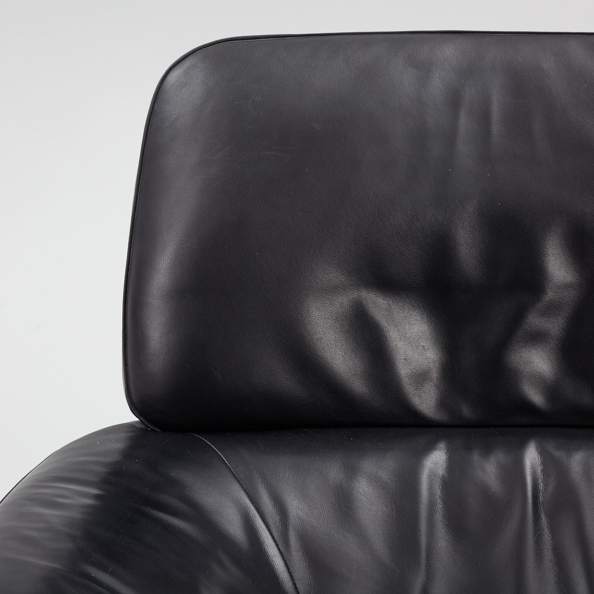 Rodolfo Dordoni, a 'Blake Soft' armchair with ottoman, Minotti, Italy.