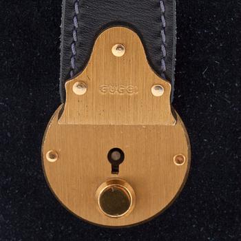 GUCCI, a blue suede and leather weekendbag.