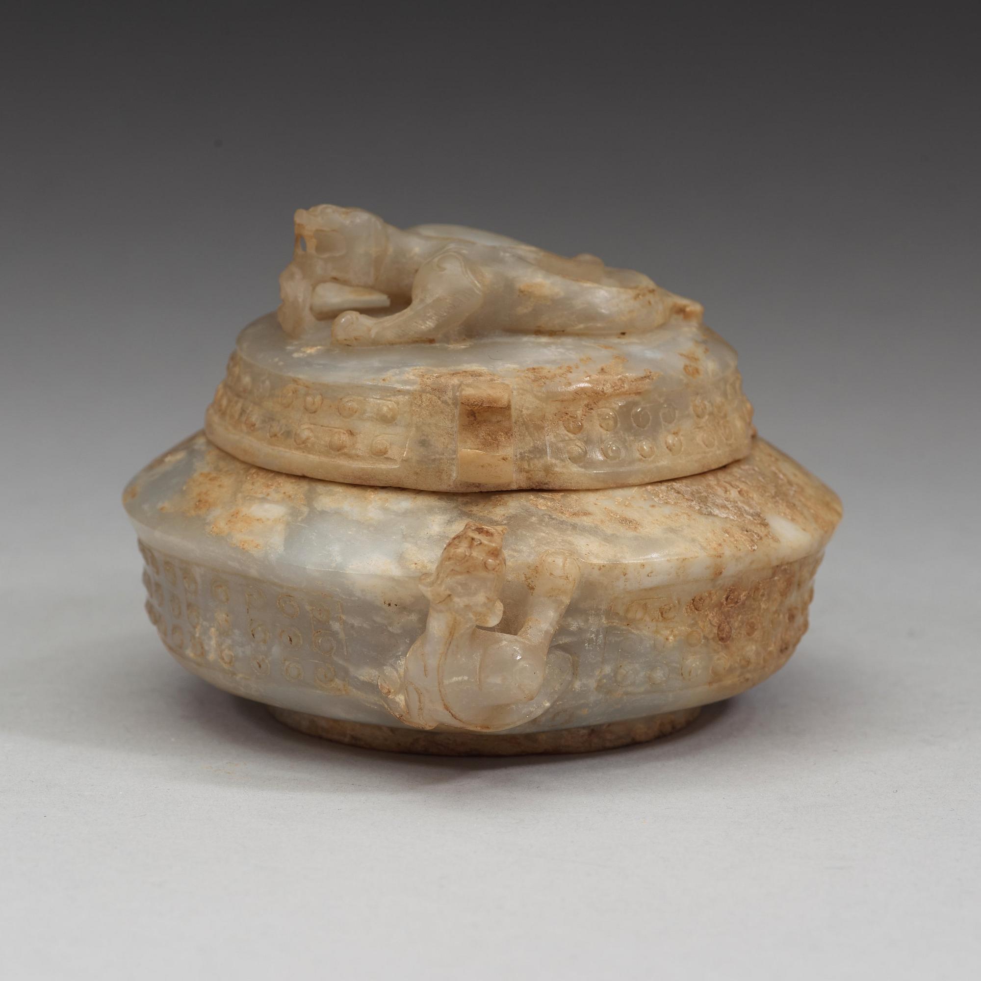 A Chinese nephrite jar with cover.