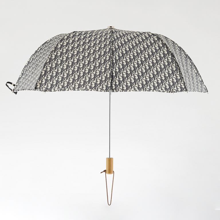 Christian Dior, a canvas weekend bag and umbrella.