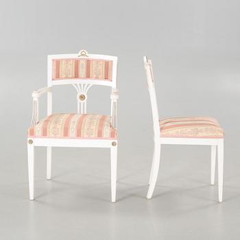 Two gustavian style armchairs and three chairs, first half of the 20th century.