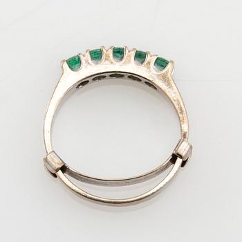 Ring 14K white gold with faceted emeralds.
