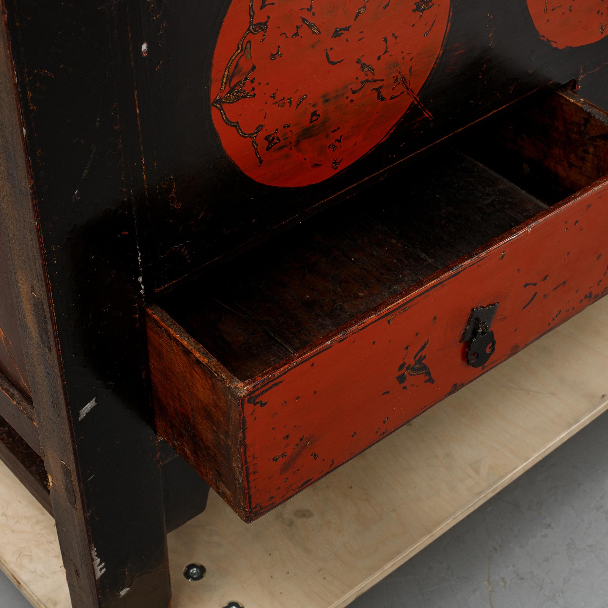 A Chinese lacquered cabinet, 20th century.