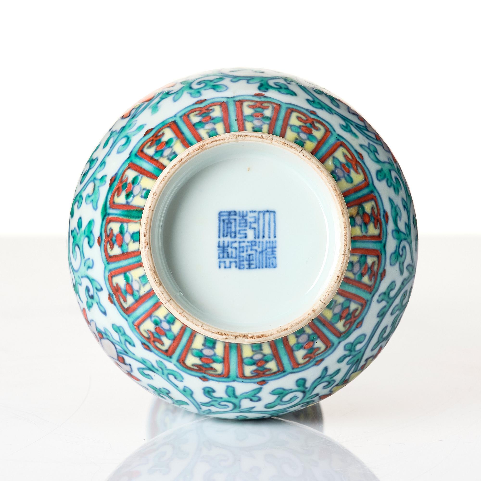 A doucai 'lotus' vase, Qing dynasty with Qianlong seal mark and of the period.