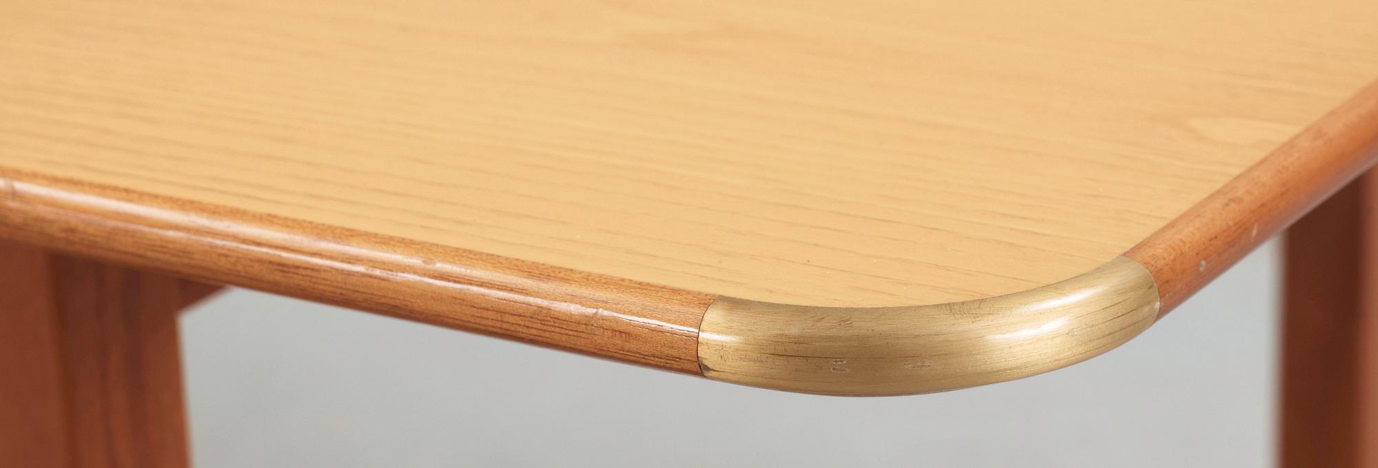A Josef Frank ash and mahogany table with brass fittings, Svenskt Tenn, model 590.