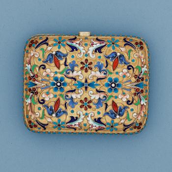 865. A Russian silver-gilt and enamel cigarette-case, makers mark of Nikolas Strulyev, Moscow 1883-1908.