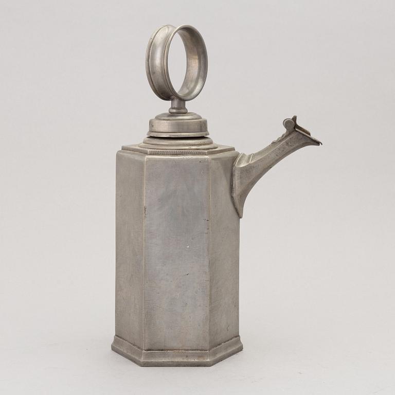 A 18th Century pewter flask.