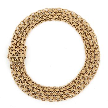 ARMLÄNK, 18K guld, Stockholm, 1956. Total vikt ca 16,69 g.