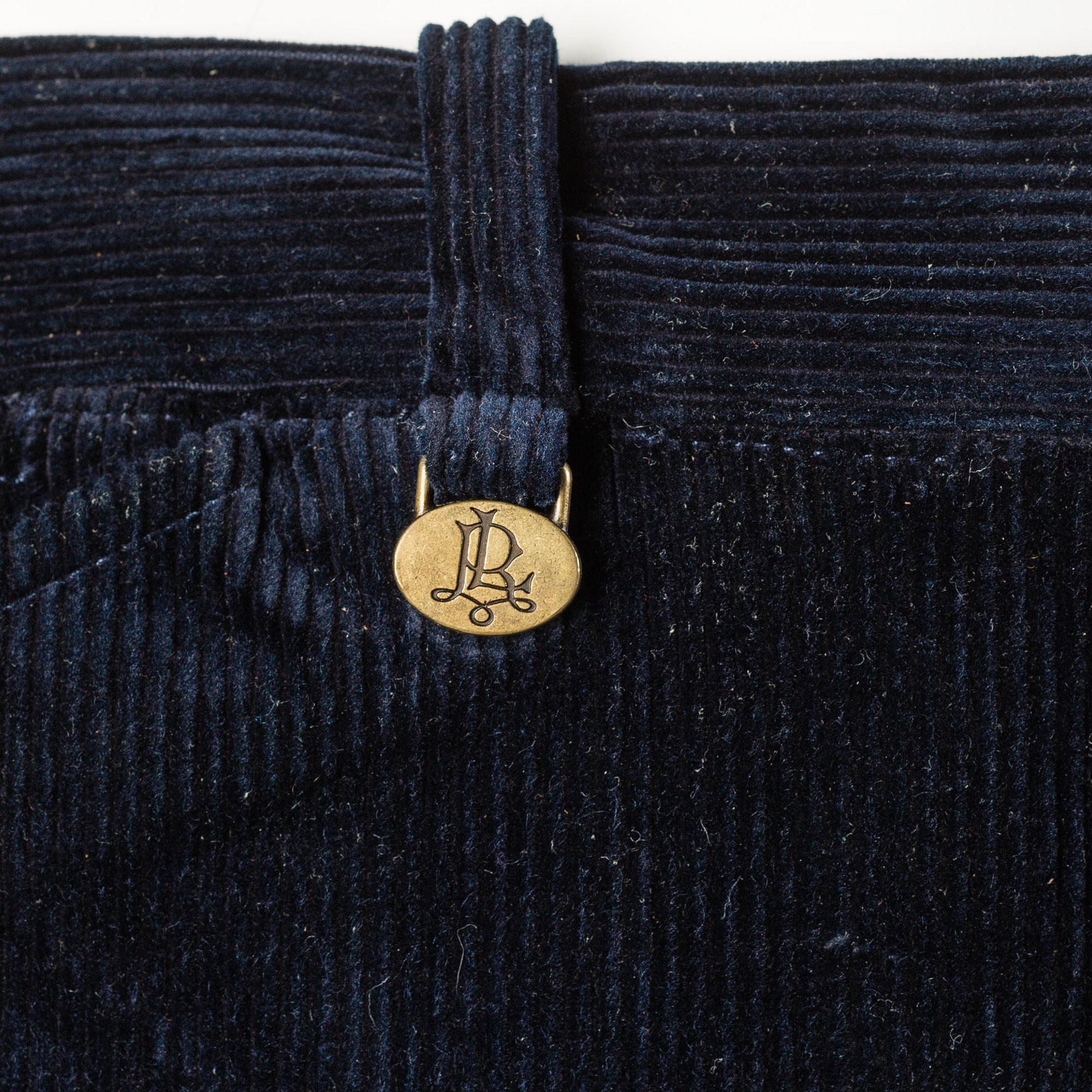 Three pair of trosers by Ralph Lauren.