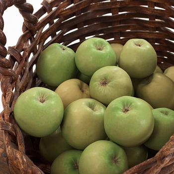 Ingrid Herrlin, a stoneware basket with 30 apples and a wheelbarrow, Sweden ca 1988.