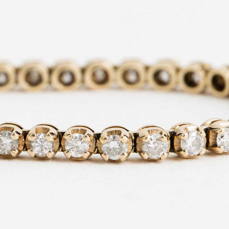 TENNIS BRACELET, 14K gold with 48 diamonds approx. 2.40 cts.
