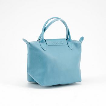 LONGCHAMP a baby blue leather bag. Bukowskis