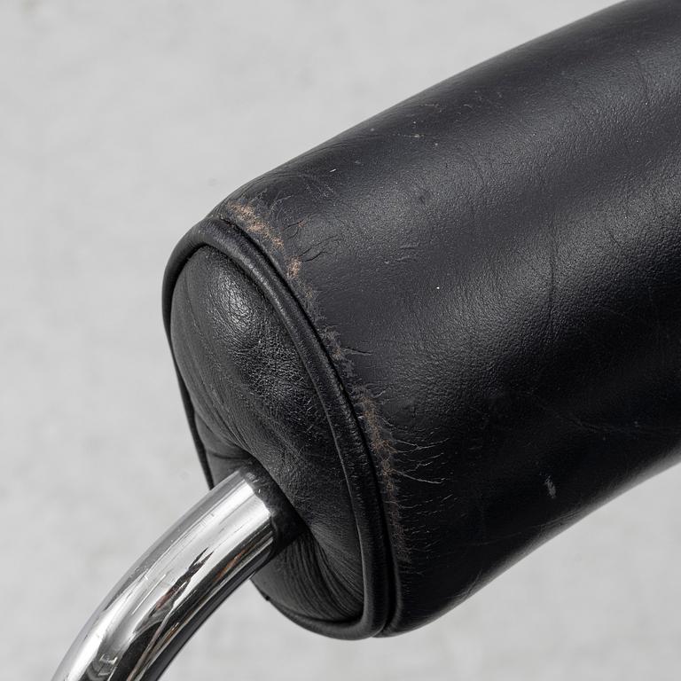 Charlotte Perriand, /Le Corbusier, swivel armchairs, a pair, model LC7, Cassina, Italy, later part of the 20th century.