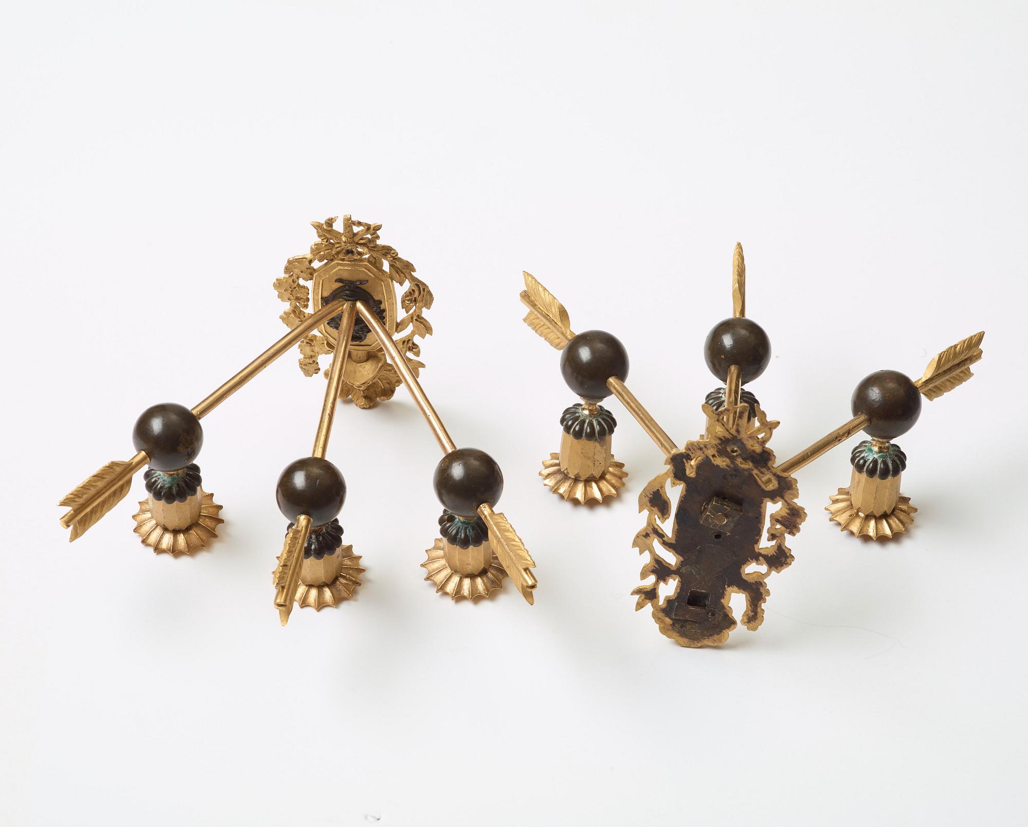 A pair of Empire three-light wall-lights, early 19th century Stockholm or St Petersburg.