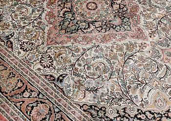 A silk carpet, Kashmir, c. 350 x 243 cm.