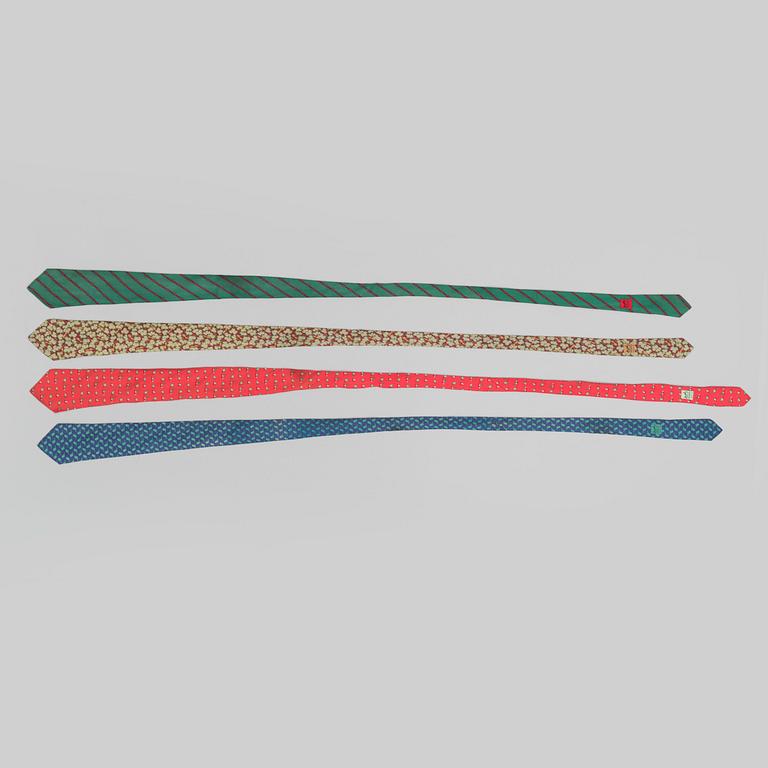 A set of four silk ties by Hermès.