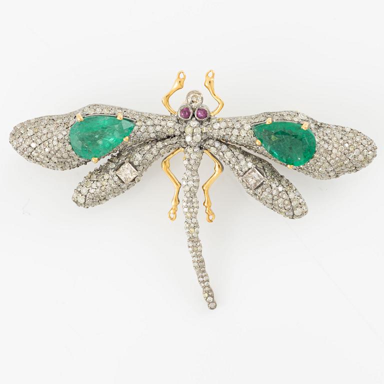 Brooch, in the form of a butterfly, silver and 14K gold set with emeralds, rubies, and princess-cut and octagonal-cut diamonds.