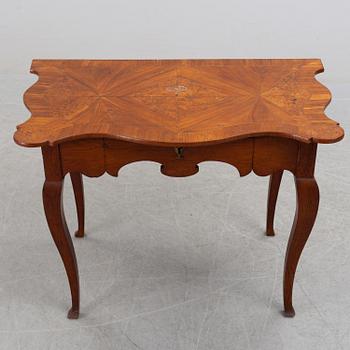 A composite rococo style writing desk.