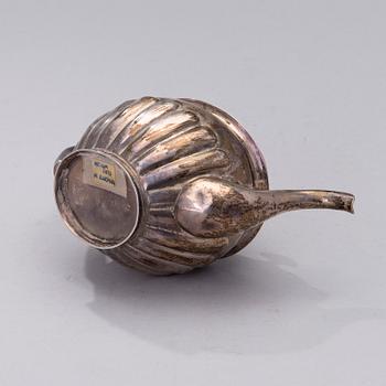 A Russian empire silver tea pot, assay master Michail Michailovich Kaprinski, Moscow 1823. Weight 306 g.