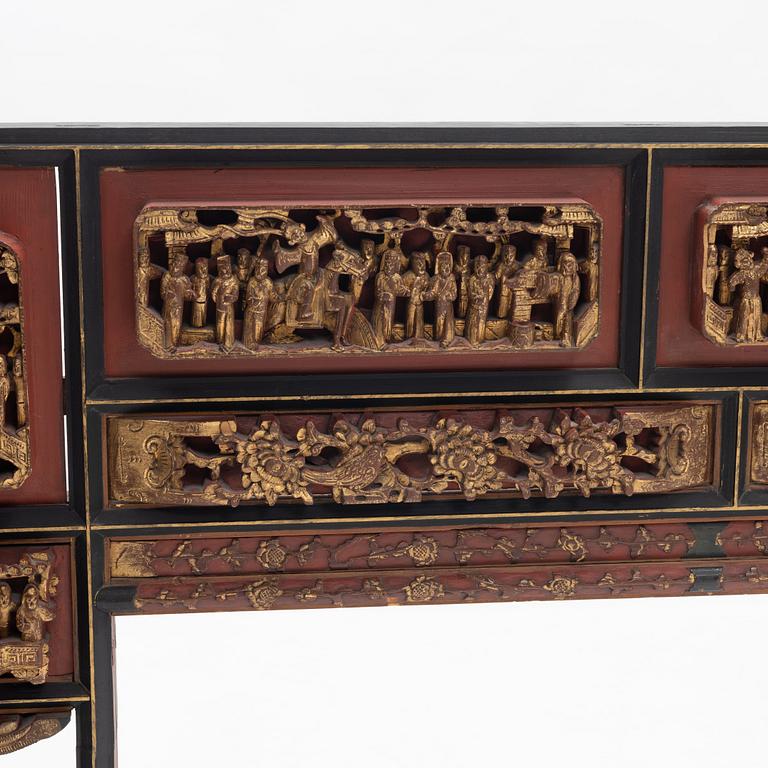 A Chinese gilt and lacquer wooden mirror, 20th century.