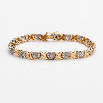 Armband, 14K guld och diamanter ca 0.16 ct totalt.