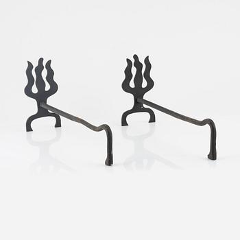 A pair of cast iron andirons, second half of the 20th century.